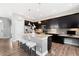 Well-lit kitchen with stainless steel appliances and granite counters at 5450 Uinta St, Denver, CO 80238