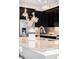 Modern kitchen features granite countertops, stainless steel appliances, and stylish pendant lighting at 5450 Uinta St, Denver, CO 80238