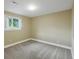 Neutral bedroom with carpet, recessed lighting, and a bright window at 12420 W Atlantic Ave, Lakewood, CO 80228