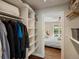 Spacious walk-in closet with built-in shelving at 12420 W Atlantic Ave, Lakewood, CO 80228