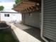 Beautiful back patio with a pergola, outdoor seating, a fireplace, and a lush garden at 4353 Wolff St, Denver, CO 80212