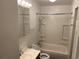 Bathroom features a shower-tub combination with white tiled walls at 4353 Wolff St, Denver, CO 80212