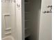 Bathroom features a shower-tub combination and shelving at 4353 Wolff St, Denver, CO 80212