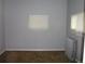 Bedroom featuring neutral walls, carpet, radiator, and ample natural light at 4353 Wolff St, Denver, CO 80212