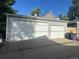 Two car garage with separate doors and concrete driveway at 4353 Wolff St, Denver, CO 80212