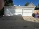 Two car garage with separate doors and concrete driveway at 4353 Wolff St, Denver, CO 80212