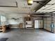 Open garage space with shelving and plentiful room for storage or projects, as well as space for parking vehicles at 4353 Wolff St, Denver, CO 80212