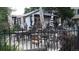 Covered outdoor seating area featuring multiple tables and chairs in a relaxing, shaded environment at 4353 Wolff St, Denver, CO 80212