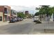 Street view showing parked cars and surrounding buildings, highlighting the area's accessibility and vibrancy at 4353 Wolff St, Denver, CO 80212