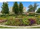 Well maintained garden with a central fountain at 690 S Alton Way # 10B, Denver, CO 80247