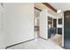 Stylish kitchen with stainless steel appliances, gray cabinets, and modern lighting fixtures at 10102 W Ida Ave # 214, Littleton, CO 80127