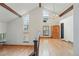 Open loft with hardwood floors, exposed beam ceiling, and lots of natural light from many windows at 10102 W Ida Ave # 214, Littleton, CO 80127