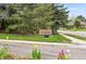 Community entrance featuring the Reflections sign and tulips at 10102 W Ida Ave # 214, Littleton, CO 80127