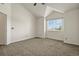 Bright bedroom featuring vaulted ceilings, neutral color palette and a sunny window at 11085 Huron St # 1108, Northglenn, CO 80234