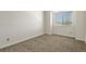 Neutral bedroom featuring a sunny window at 11085 Huron St # 1108, Northglenn, CO 80234