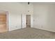 Neutral bedroom featuring a doorway to the bathroom at 11085 Huron St # 1108, Northglenn, CO 80234