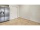 Kitchen area featuring stainless steel refrigerator, pantry, and tiled floors at 11085 Huron St # 1108, Northglenn, CO 80234