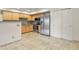 Well-lit kitchen with stainless steel appliances, ample cabinet space, and tiled flooring at 11085 Huron St # 1108, Northglenn, CO 80234
