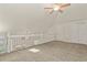 Spacious loft area with carpet and a ceiling fan, perfect for relaxing or entertaining at 11085 Huron St # 1108, Northglenn, CO 80234