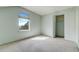 Bedroom features carpet flooring, a closet, and a bright window at 44626 Lariat Trl, Elizabeth, CO 80107