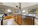 Bright kitchen with stainless steel appliances, center island, and a scenic view at 44626 Lariat Trl, Elizabeth, CO 80107