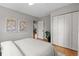 Clean bedroom with hardwood floors and ample closet space at 4438 S Elati St, Englewood, CO 80110