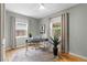 Inviting office with hardwood floors, large windows, and plenty of natural light at 4438 S Elati St, Englewood, CO 80110