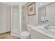 Finished basement bathroom featuring a glass-enclosed shower, white vanity, and tile flooring at 901 Sage Sparrow Cir, Highlands Ranch, CO 80129