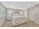 Finished basement bedroom with neutral carpet, a queen bed, white nightstands, and recessed lighting at 901 Sage Sparrow Cir, Highlands Ranch, CO 80129