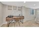 Basement home office featuring built-in shelving, wood desk, chair, and a window at 901 Sage Sparrow Cir, Highlands Ranch, CO 80129
