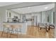 Kitchen with stainless steel appliances and open layout to dining area, great for entertaining at 901 Sage Sparrow Cir, Highlands Ranch, CO 80129