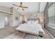 Neutral color palette and carpet flooring highlight the spacious main bedroom at 901 Sage Sparrow Cir, Highlands Ranch, CO 80129