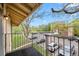 Balcony view overlooking parking area and a grassy green space at 12142 Melody Dr # 301, Denver, CO 80234