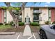 Apartment building entrance featuring two stories, multiple balconies and a secure entry point at 12142 Melody Dr # 301, Denver, CO 80234