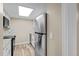 Modern kitchen with stainless steel appliances, ample counter space, and bright lighting at 12142 Melody Dr # 301, Denver, CO 80234