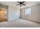 Bedroom featuring large windows and an open floor plan at 2705 S Danube Way # 306, Aurora, CO 80013