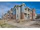 View of an apartment complex with balconies and brick and siding exterior at 2705 S Danube Way # 306, Aurora, CO 80013