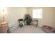 Versatile bedroom perfect for an office setup, complete with desk and computer equipment at 1908 Homestead Dr, Fort Lupton, CO 80621