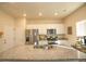 Bright kitchen features granite countertops, stainless steel appliances, and white cabinets at 1908 Homestead Dr, Fort Lupton, CO 80621