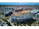 Panoramic aerial shot featuring a modern condo building with city and mountain views at 2958 Syracuse St # 316, Denver, CO 80238