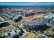 Expansive aerial view showing the community, neighborhood and mountain views in the background at 2958 Syracuse St # 316, Denver, CO 80238
