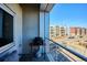 Balcony featuring a grill offers a delightful space to enjoy outdoor cooking and city views at 2958 Syracuse St # 316, Denver, CO 80238