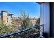 Enjoy the lovely view from the balcony, overlooking lush greenery and a vibrant community at 2958 Syracuse St # 316, Denver, CO 80238