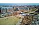 Scenic aerial view of a park, showcasing walking paths, greenery, and nearby residences at 2958 Syracuse St # 316, Denver, CO 80238