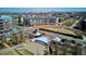 Aerial view showcasing a park stage with surrounding landscaping and residential buildings at 2958 Syracuse St # 316, Denver, CO 80238