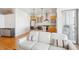 Inviting living space combines modern kitchen with a comfortable seating area and lots of natural light at 2958 Syracuse St # 316, Denver, CO 80238