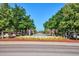 Charming street view, lush trees on either side of the road, creating an inviting atmosphere at 2958 Syracuse St # 316, Denver, CO 80238