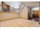 Cozy foyer with staircase, carpet and hardwood floors, and natural light at 6969 W Yale Ave # 81, Denver, CO 80227