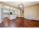 Spacious living room with hardwood floors adjacent to the open kitchen at 6969 W Yale Ave # 81, Denver, CO 80227