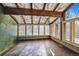 Sun room with a glass ceiling and multiple shuttered windows at 6969 W Yale Ave # 81, Denver, CO 80227